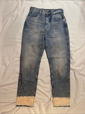 Scotch & Soda Faded Blue Relaxed Jeans with Bleached Hem and “watermark” designs